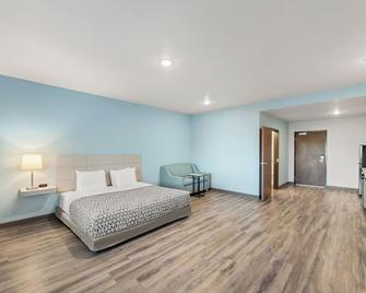 Woodspring Suites Jackson Pearl I-20 - Pearl - Ložnice