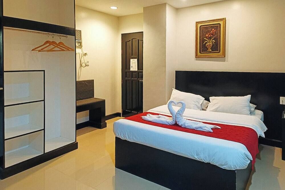 Check Inn Hotel Dumaguete City by RedDoorz - Dumaguete - Camera da letto