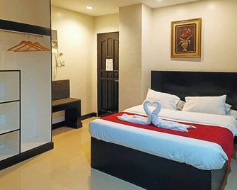 Check Inn Hotel Dumaguete City by RedDoorz - Dumaguete City - Soveværelse
