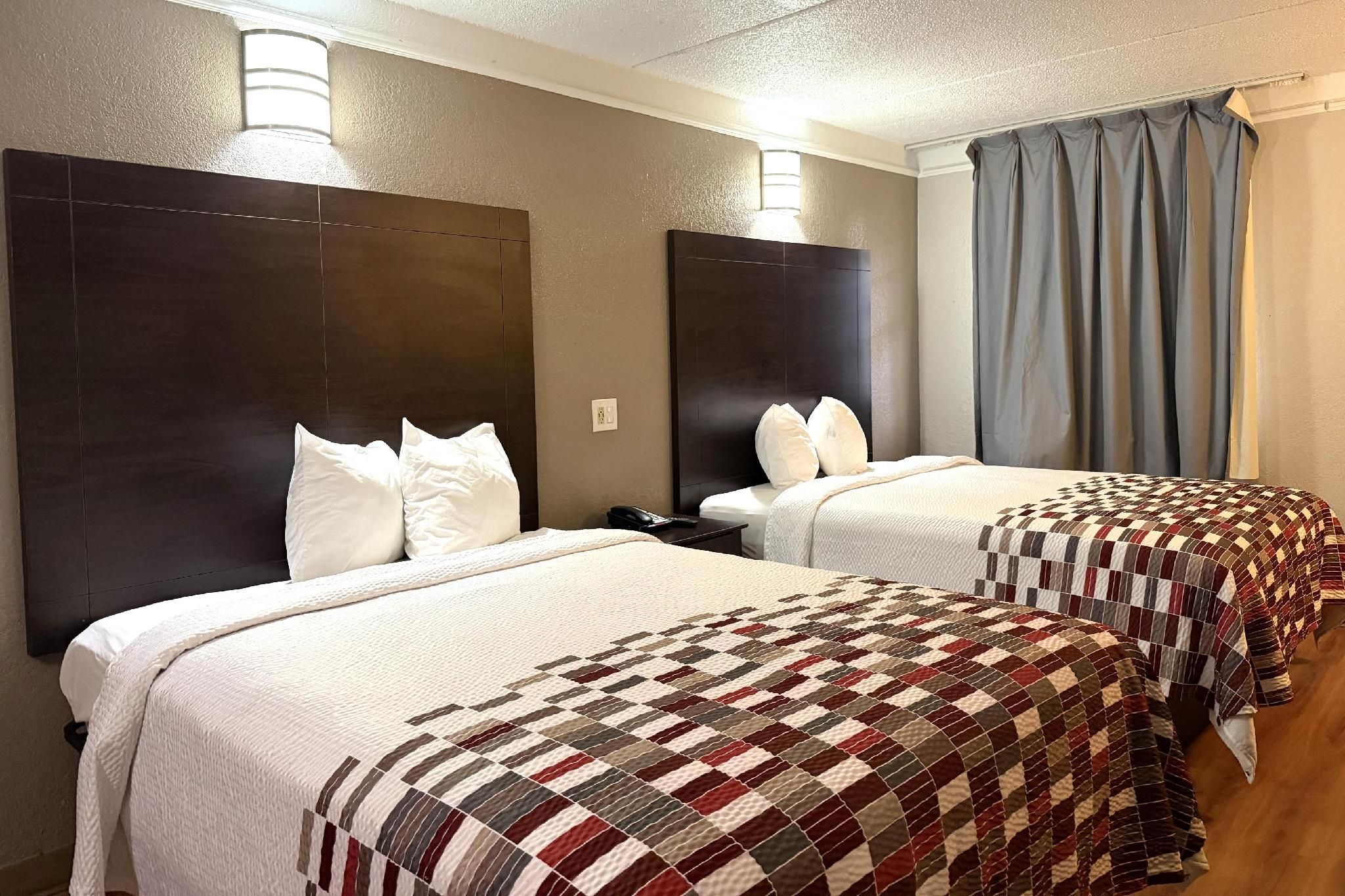 Red Roof Inn & Suites Houston- Hobby Airport - יוסטון - חדר שינה
