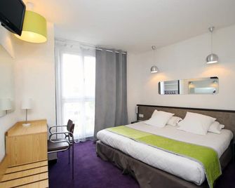 Hôtel Peyramale - לורד - חדר שינה