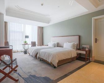 Galactic G-Luxe Hotel - נאנצ'אנג - חדר שינה