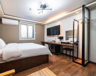 Danyang Hotel Dozen - Condado de Danyang - Habitación