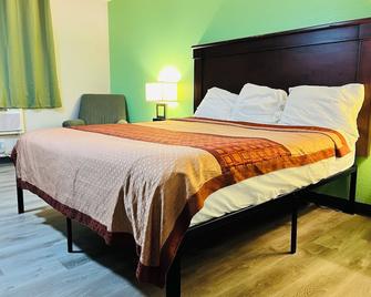 Super Inn By OYO Lansing MI - Lansing - Schlafzimmer