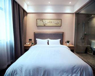 Greentree Alliance Liuan Jinzhai County Gubei Town Jindu Garden Hotel - Lu’an - Bedroom