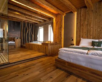 Teverone Suites & Wellness - Camera Capriolo - Chies - Habitación