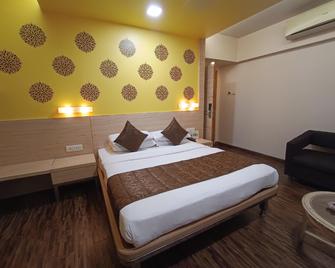 Rajhans Hotel - מומבאי - חדר שינה