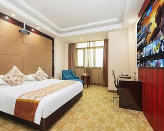 Days Hotel Shishi Fujian - Quanzhou - Bedroom