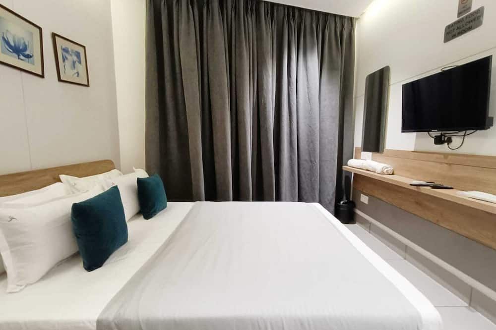 Hotel Kant by GoHotels - Near Shree Dwarkadhish Temple - Dwārka - Schlafzimmer