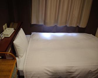 Hotel Palms Tenmonkan - Kagoshima - Slaapkamer