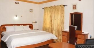 Cute Villa Hotel and Suites - Uyo - Bedroom