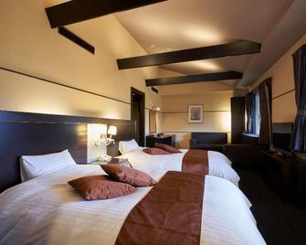 Forest Hotel Rochefort - Maniwa - Ložnice