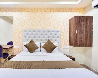 Hotel La Sky Boutique Airport Zone Hyderabad - Haiderabad - Slaapkamer
