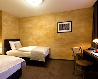 Penzion Berg - ברטיסלבה - חדר שינה