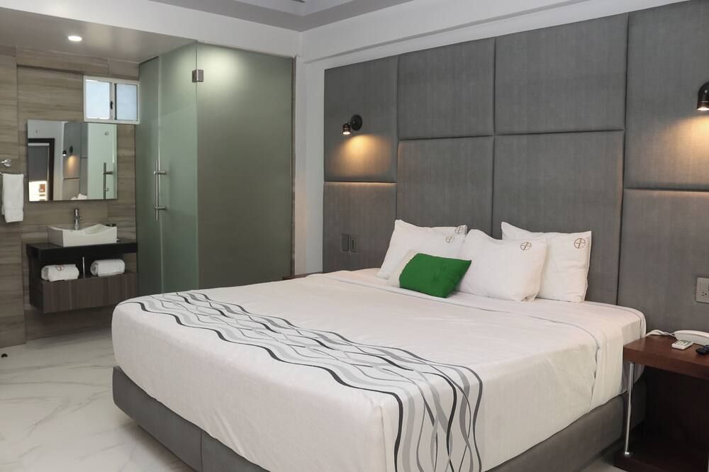 هوتل جراند وان بلازا - تيجوانا - غرفة نوم