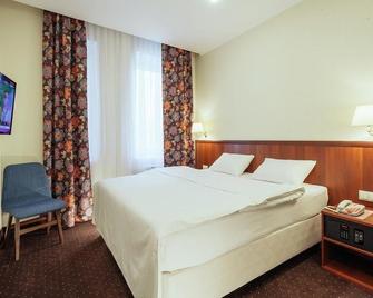 Amaris Hotel - Velikije Loeki - Slaapkamer