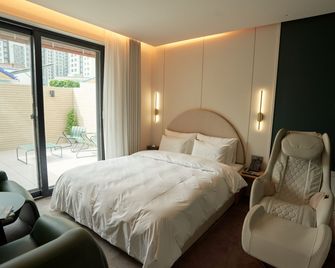 Brown Dot Hotel Gunsan Terminal Branch - Gunsan - Schlafzimmer