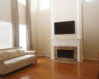 Massive house; corporate, work crew and family friendly. - Cypress - Living room