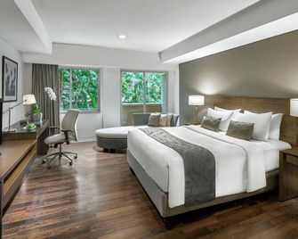 Delonix Hotel Karawang - Karawang - Bedroom