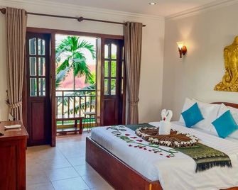 Villa Indochine d'Angkor - Siem Reap - Camera da letto