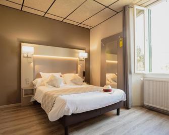 Logis Hotel Restaurant Family & Spa - Meyrueis - Спальня