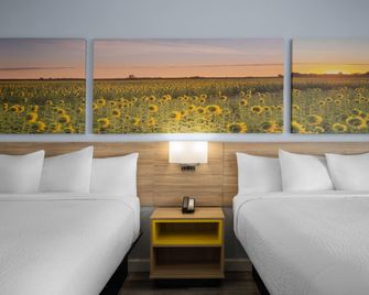 Days Inn by Wyndham Dodge City - Dodge City - Slaapkamer