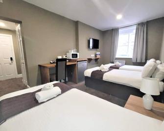 ذا نيو كاونتي هوتل - غلوستر - غرفة نوم