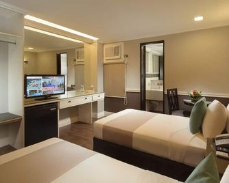 The MetroCentre Hotel and Convention Center - Tagbilaran - Bedroom