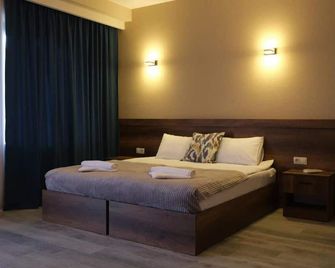 Hotel Axien Kazbegi - Stepantsminda - Camera da letto