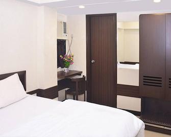 A1 Hotel - Mumbai - Schlafzimmer