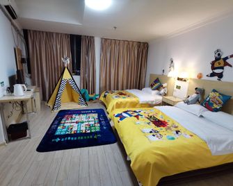 Golden Holiday Hotel (Wuzhou Qilou City Branch) - Wuzhou - Bedroom