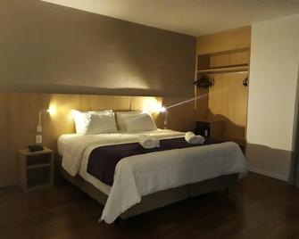 Legacy Hotel - Guaratingueta - Ložnice