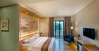 Tama Boutique Hotel - באנדונג - חדר שינה