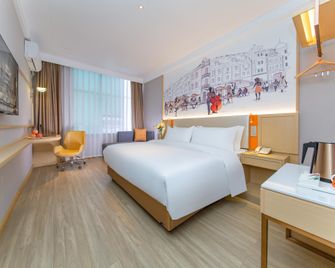 Vienna 3 Best Hotel Hubei Huanggang Tuanfeng Desheng Avenue Pedestrian Street - Huanggang - Building