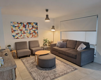 At Home Apartments - Sale - Huiskamer
