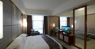 Qionghai Hao Springs Boutique Hotel - Qionghai - Bedroom