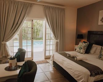 كازا بيتش جيستهاوس - دوربان - غرفة نوم