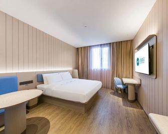 Hanting Hotel Shanghai Daxuecheng Middle Road - שנחאי - חדר שינה
