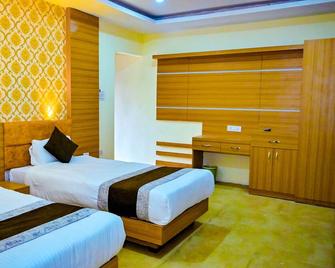 Hotel Star Holiday Pvt Ltd - Siddharthanagar - Bedroom