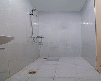 Capital O 92300 Koala House - Pekanbaru - Badkamer