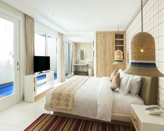 Benoa Sea Suites and Villas - South Kuta - Bedroom