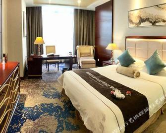 Wanfeng Grand Hotel - Xingtai - Schlafzimmer