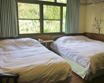 Da Tong Hotel - Nantou City - Bedroom