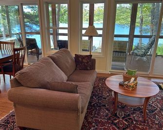 3-Bedroom, 2-Bath Shorefront Retreat on Big Squam Lake - Center Harbor - Living room