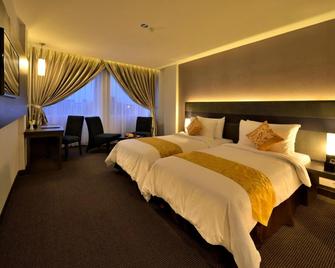 Tjokro Hotel Pekanbaru - Pekanbaru - Habitación
