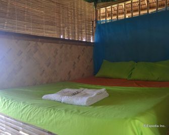 Tapik Beach Park Guest House - אל נידו - חדר שינה