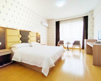 Saijia Shidai Hotel - Chengdu - Bedroom