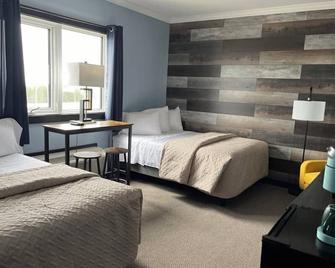 Acadian Hotel - Stephenville - Bedroom