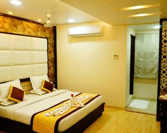 Hotel Golden Laurel Inn - Deoria - Bedroom