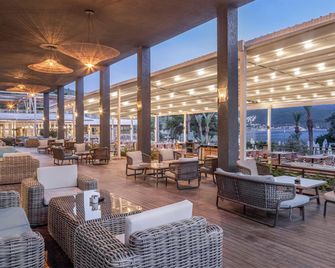 DoubleTree by Hilton Bodrum Isil Club Resort - Bodrum - Restaurant
